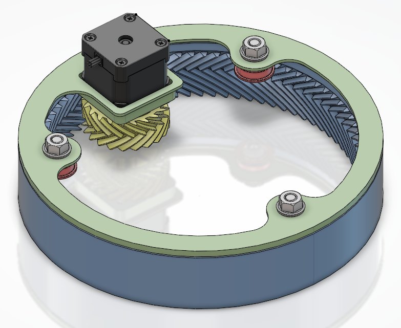 Rotating base assembly: internal herringbone ring gear, pinion on the stepper, and the top plate that carries the head